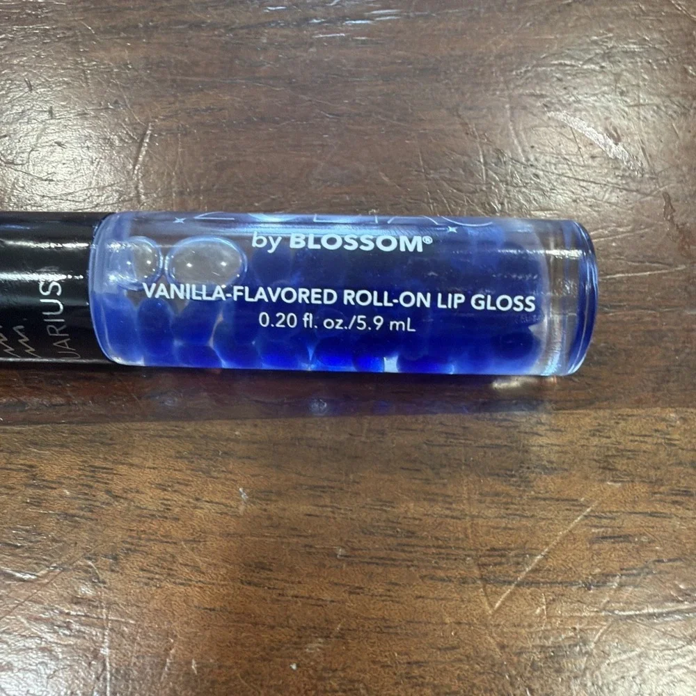 Blossom Zodiac Sign Vanilla Scented Moisturizing Roll-On Lip Gloss - AQUARIUS